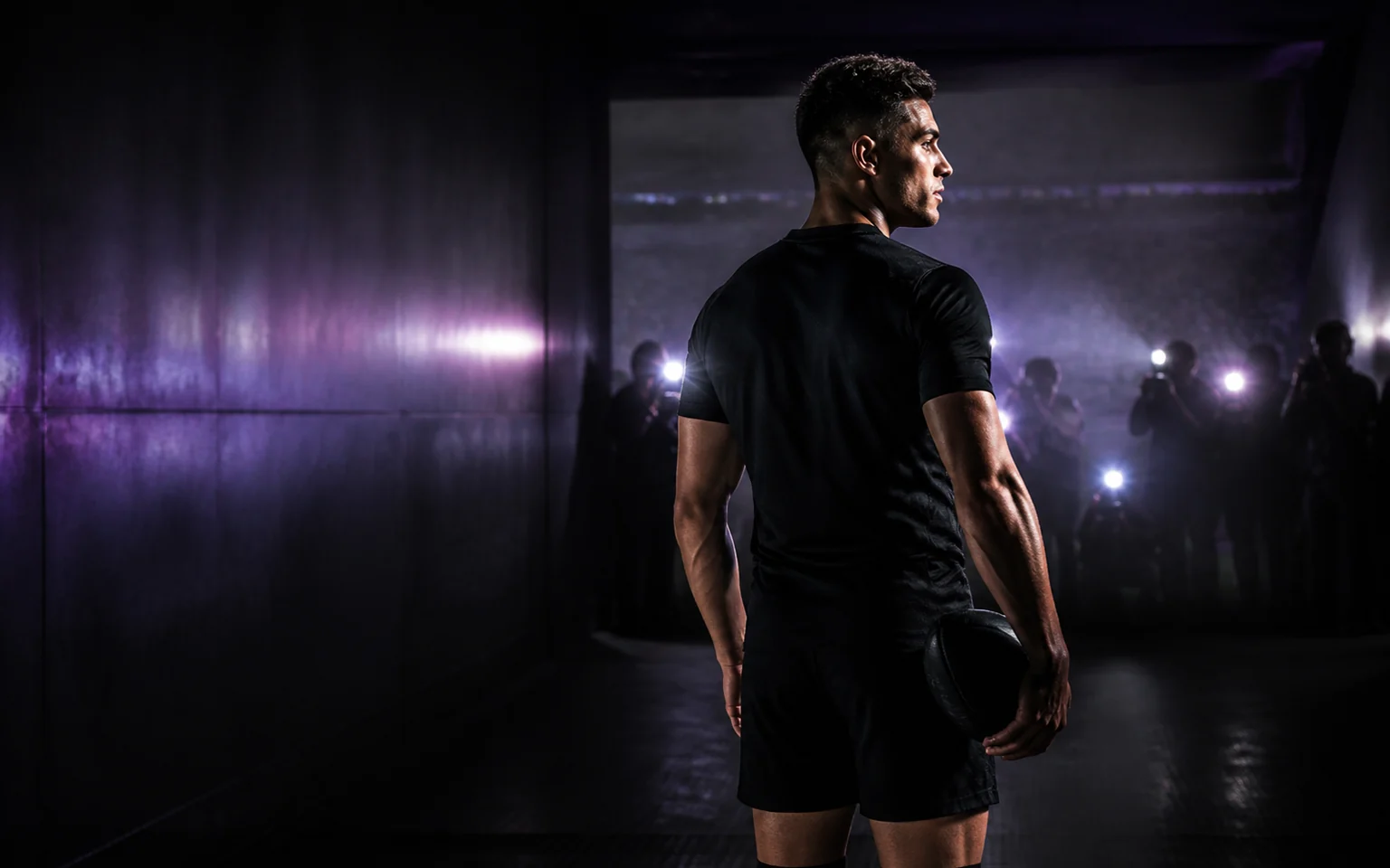 Athlete entering a cinematic partnership announcement setting.